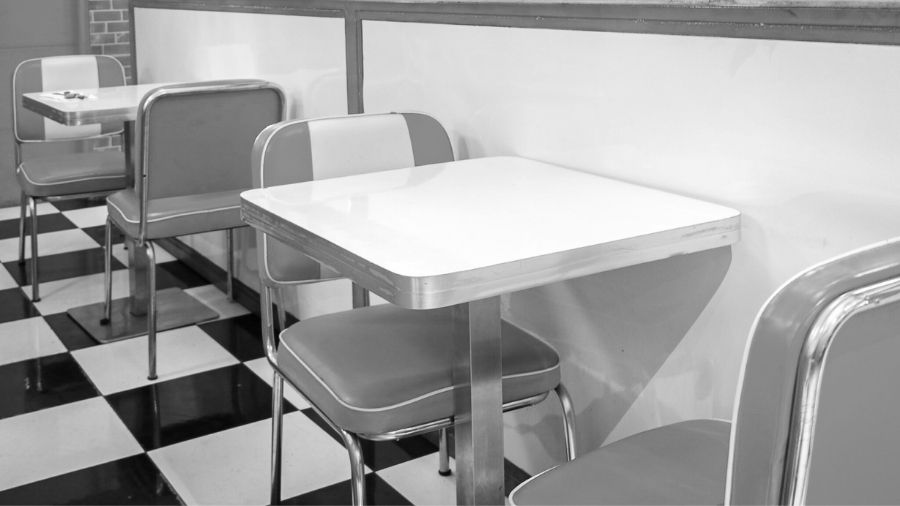 A black-and-white image of a classic American diner