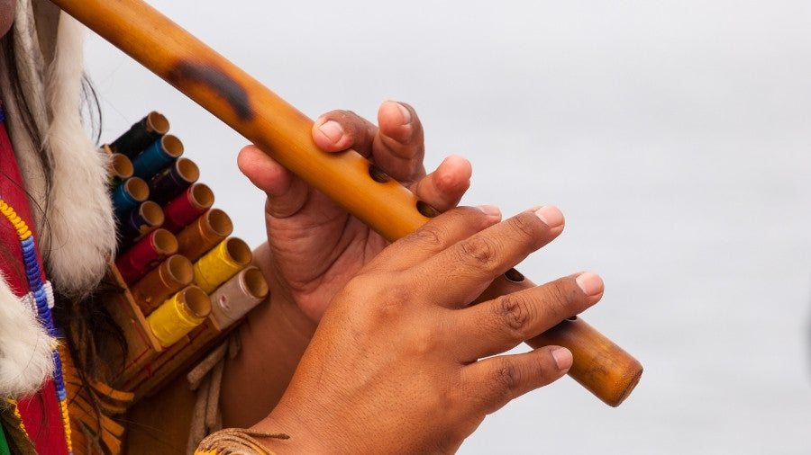 Man playing a Cherokee Flute