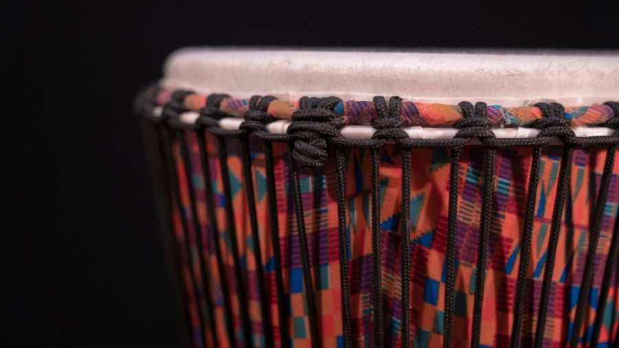 Close up of djembe drum rope tuning system