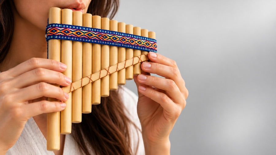 Women playing songs on the antares panpipes