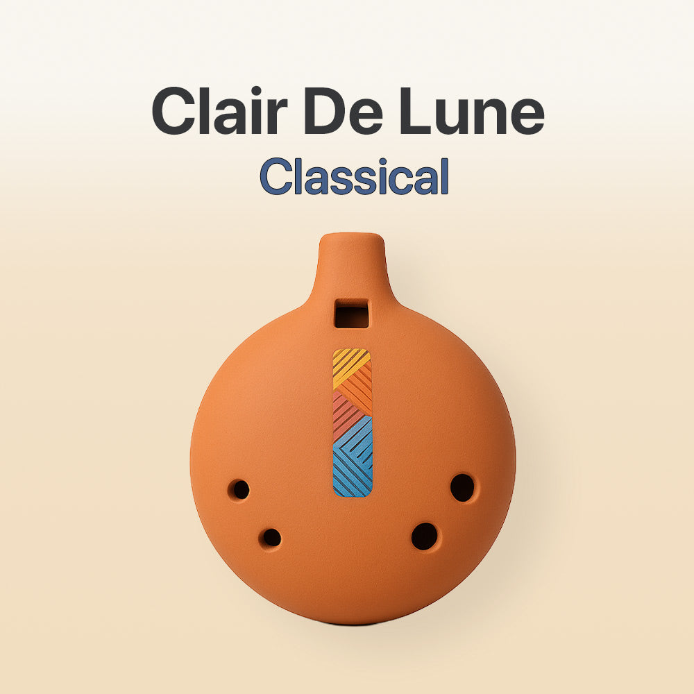 Ceramic ocarina with geometric design on a beige background, featuring the text 'Clair De Lune Classical'.