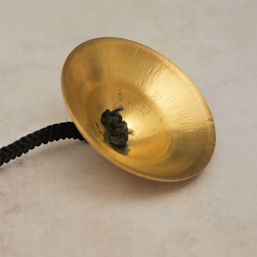 Close-up of the interior of Brass Manjira Prayer Bells, highlighting the structure.