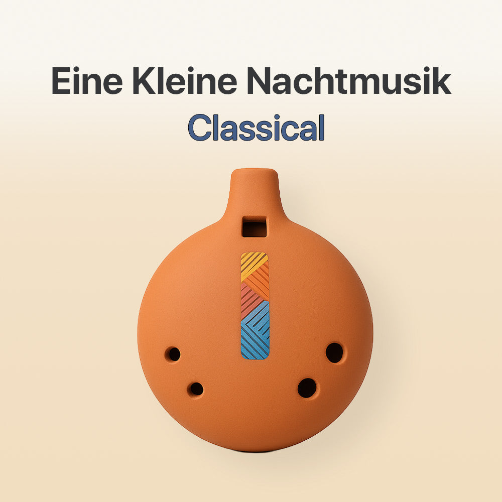 Ceramic ocarina with colorful design on a beige background, featuring the text 'Eine Kleine Nachtmusik Classical'.