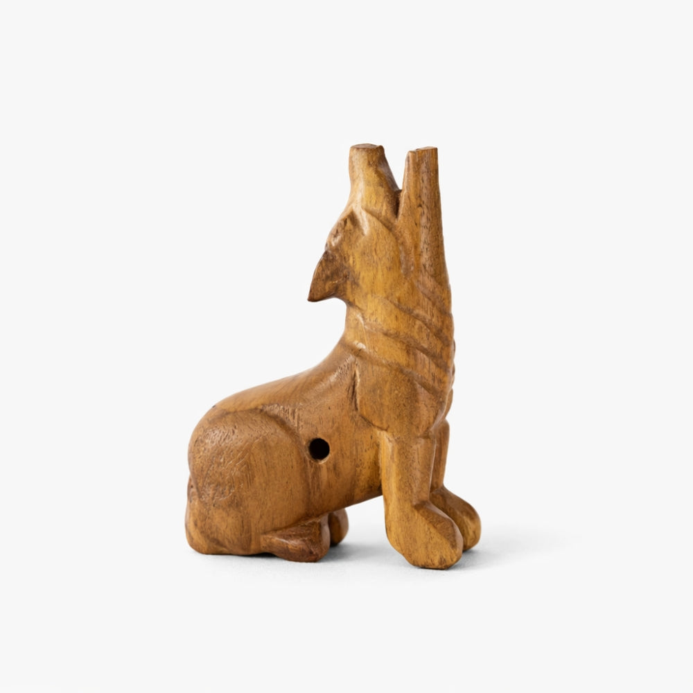 Solid Wood Howling Wolf Whistle Aanimal figurine on a white background