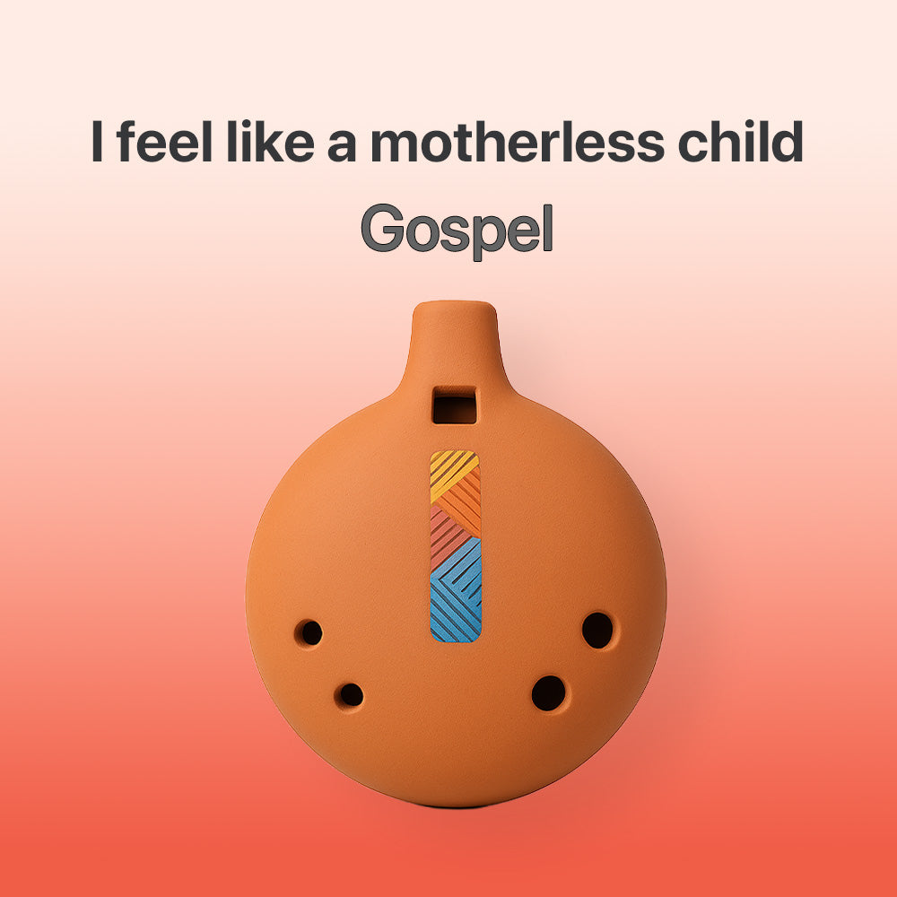 Ceramic ocarina with colorful design on a gradient background, featuring text 'I feel like a motherless child Gospel'.