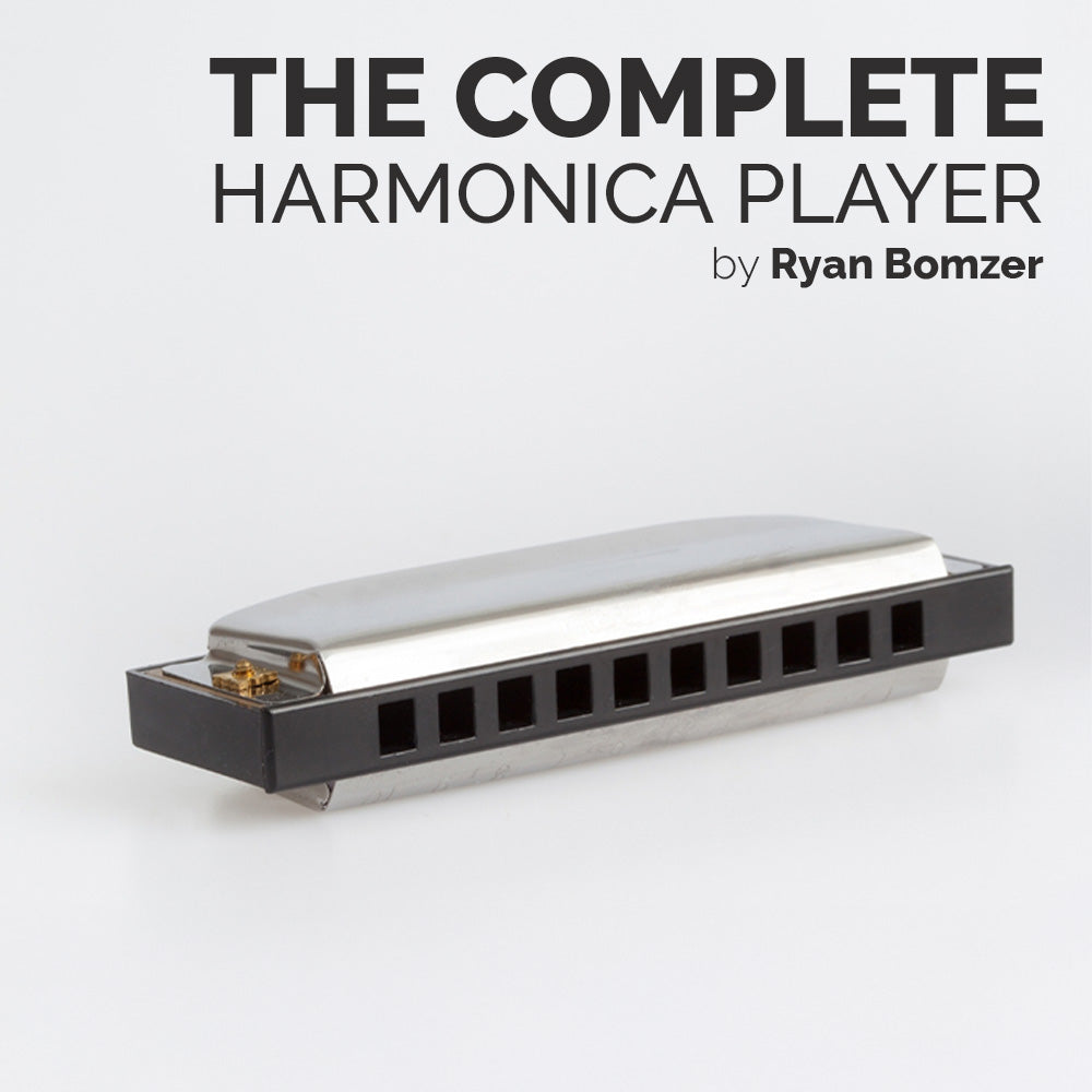 Harmonica on a white background with text 'The Complete Harmonica Player by Ryan Bomzer'.