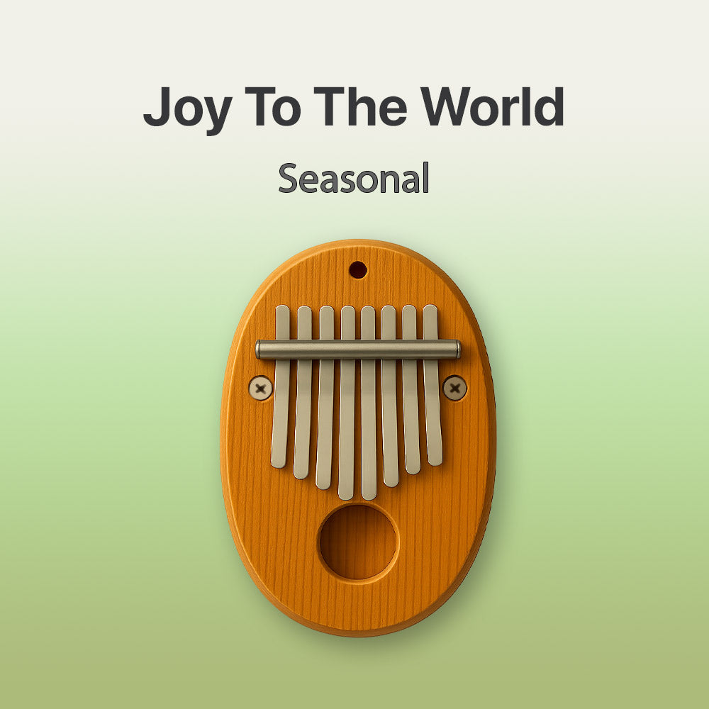 Wooden kalimba with 'Joy To The World Seasonal' text on a light green background