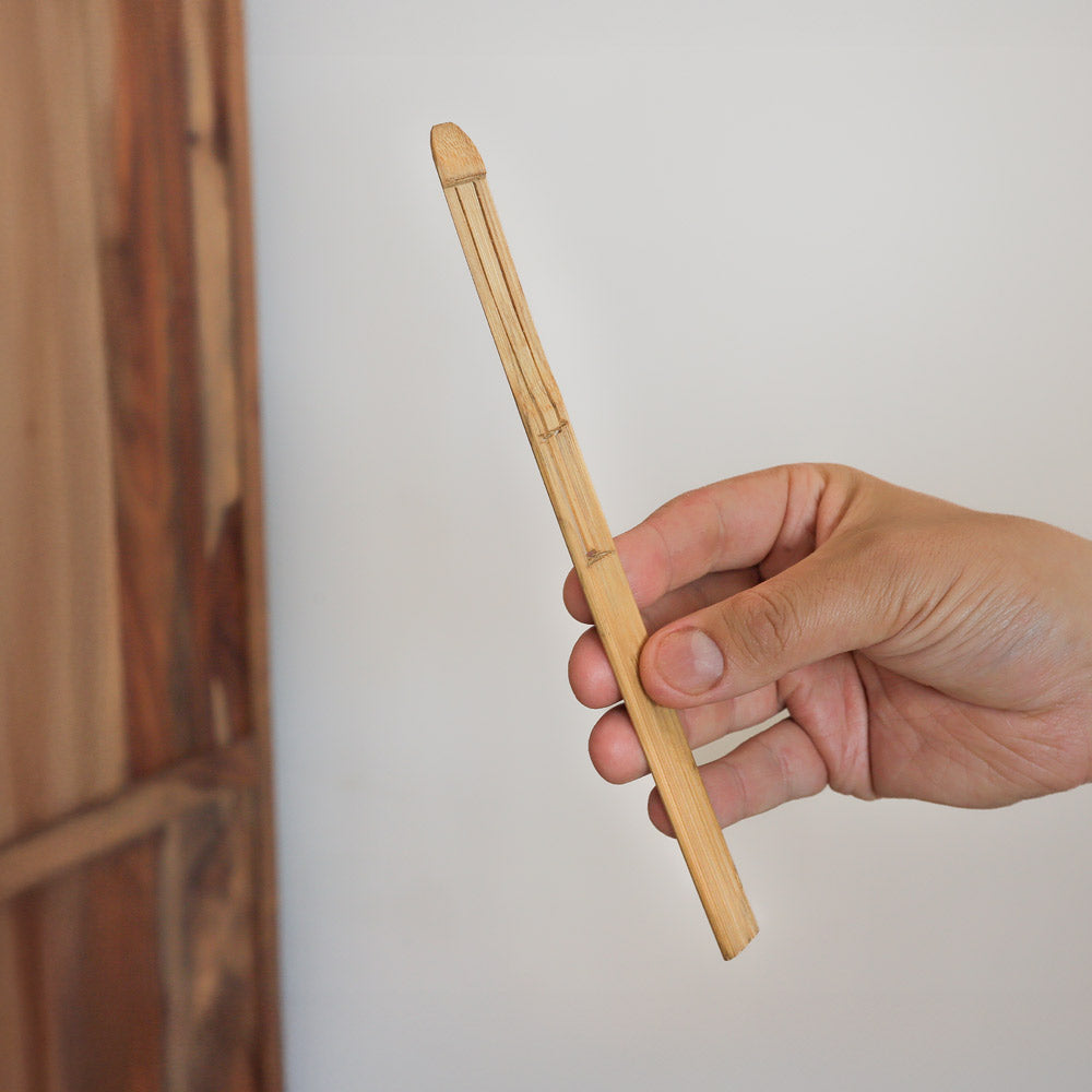 natural jaw harp karinding in hand