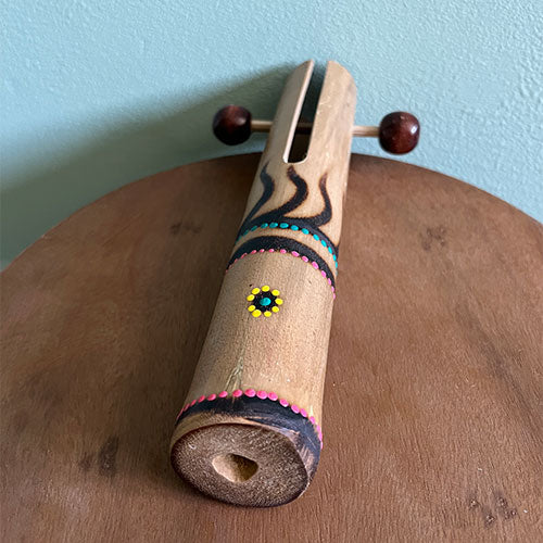 Dot painted bamboo kubu t clacker instrument