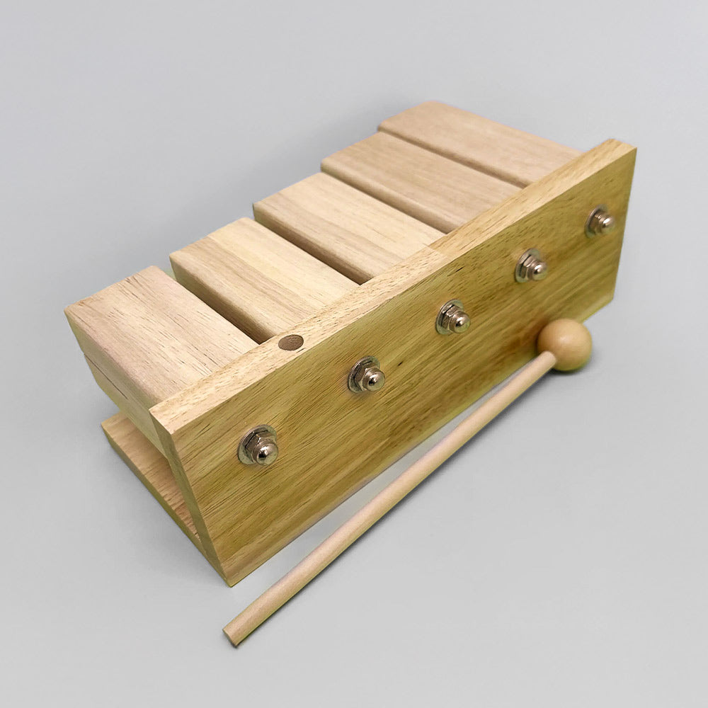 Back view of the Matsu Goonkai Tone Block, highlighting the solid wood construction and five-note layout.