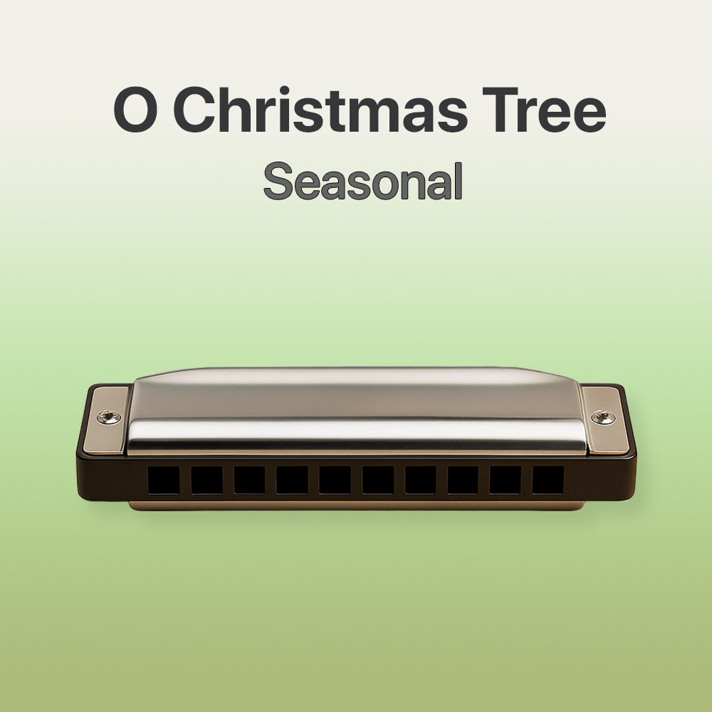 Harmonica with 'O Christmas Tree Seasonal' text on a green background