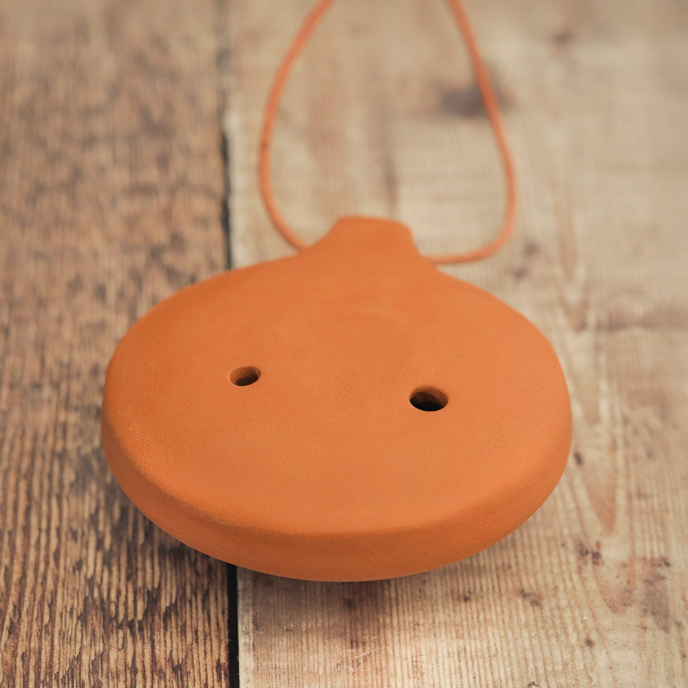 A close up of the back of the Ocarina Pro Alto