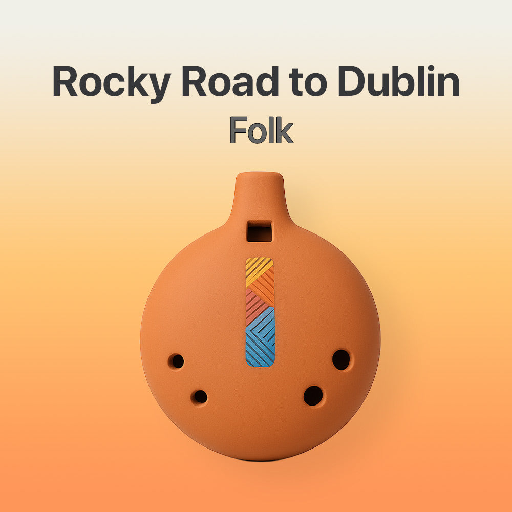 Ceramic ocarina with colorful design on a gradient background, featuring text 'Rocky Road to Dublin Folk'.