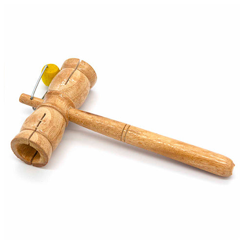 Close up of wooden Tring clacker instrument