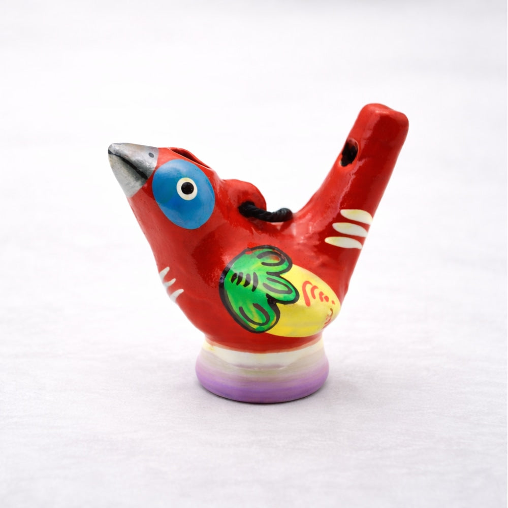 Brown ceramic bird-shaped whistle on a white background