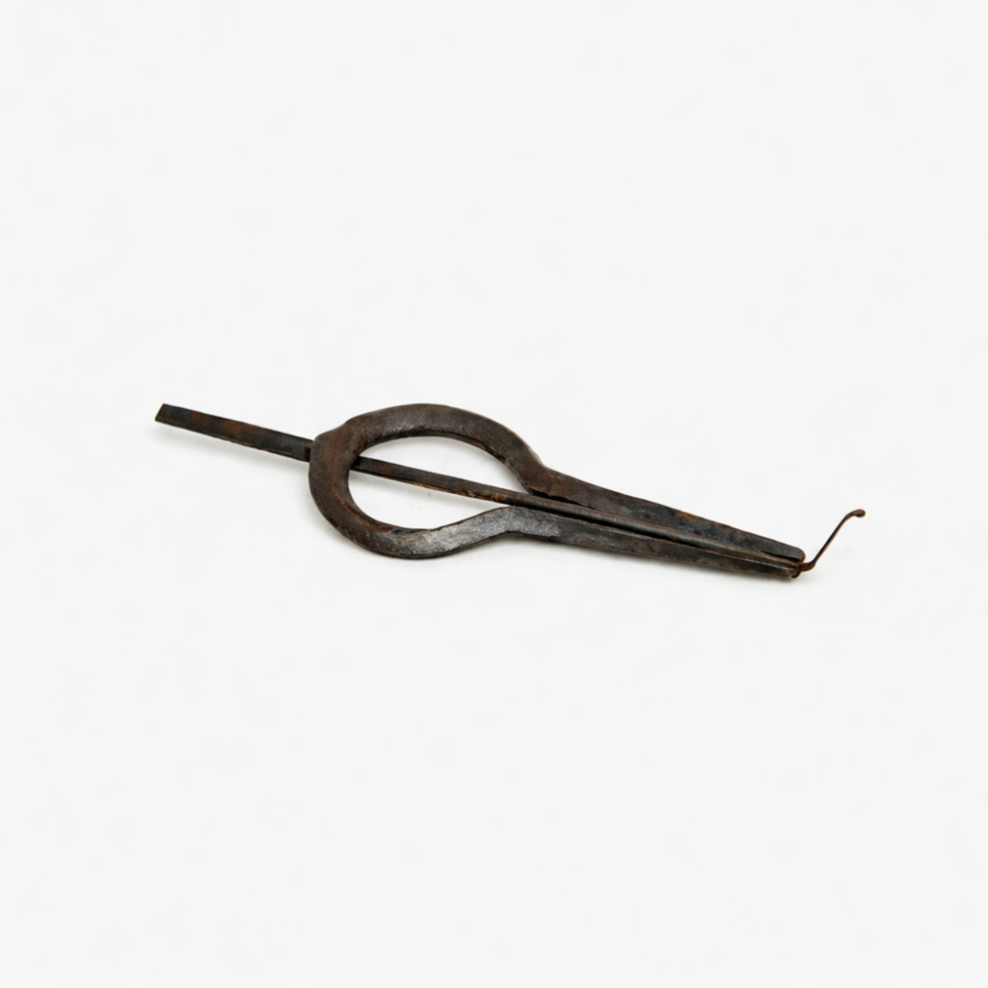 solid cast iron large mouth jaw harp with grey background