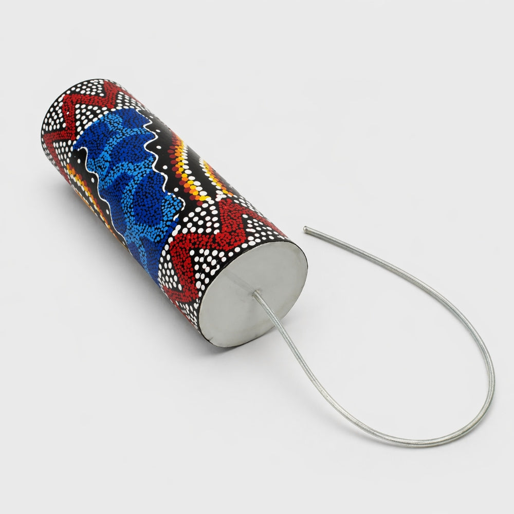 Balinese painted thunder drum on grey background