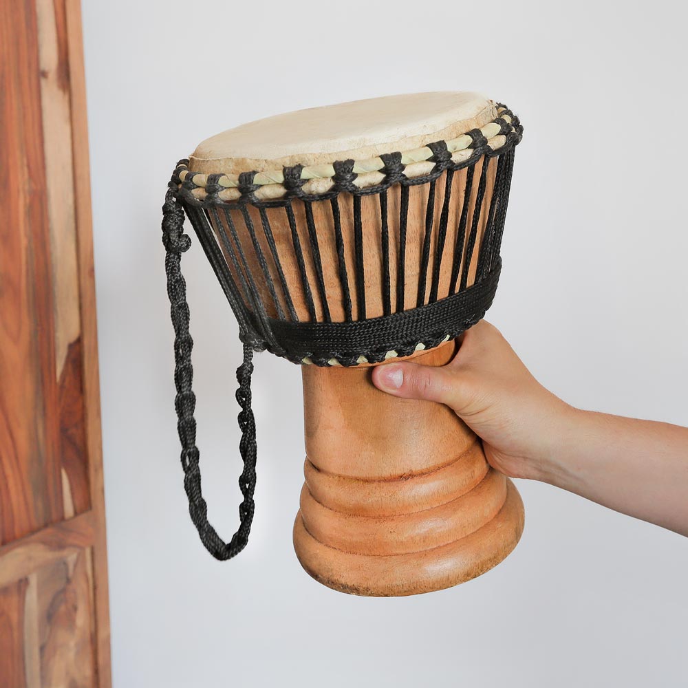 wooden Ghanian djembe drum 8" in hand