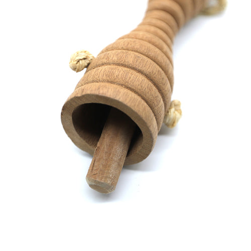 Close up of wooden knocker inside double ended clacker 