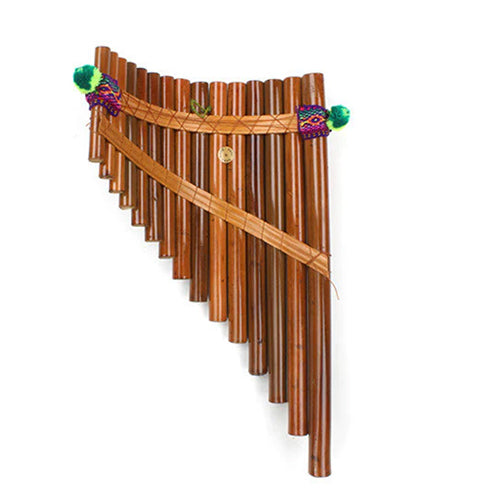 back side of Peruvian large pan pipes with ribbon.