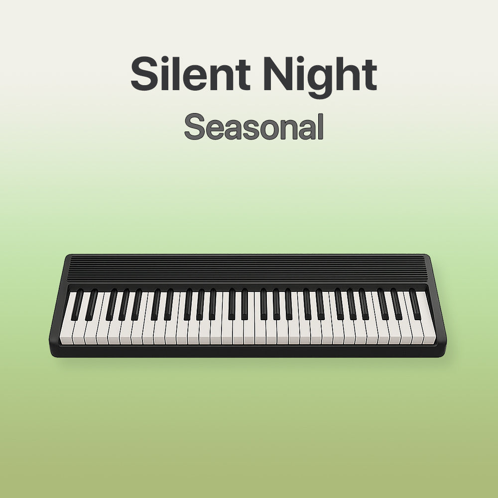Keyboard with 'Silent Night Seasonal' text on a light green background
