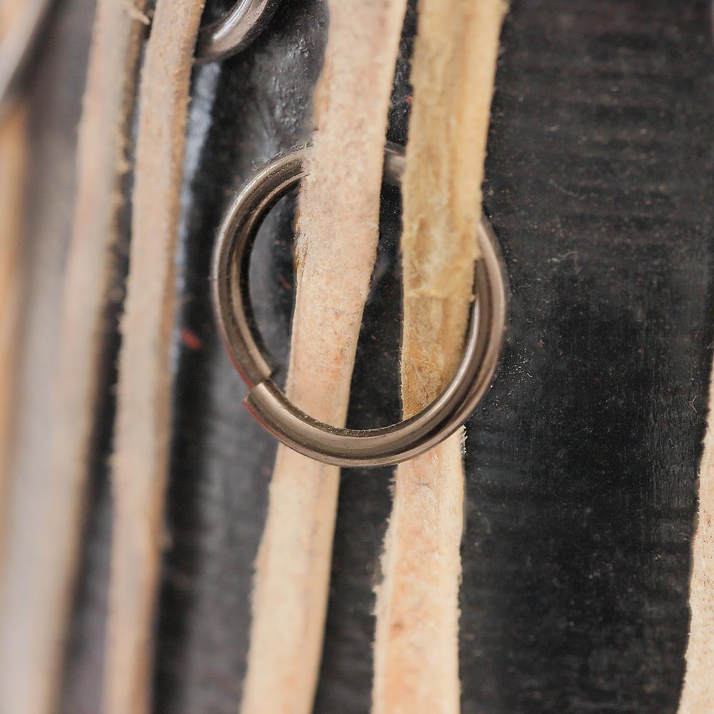 close up of small black madal drum