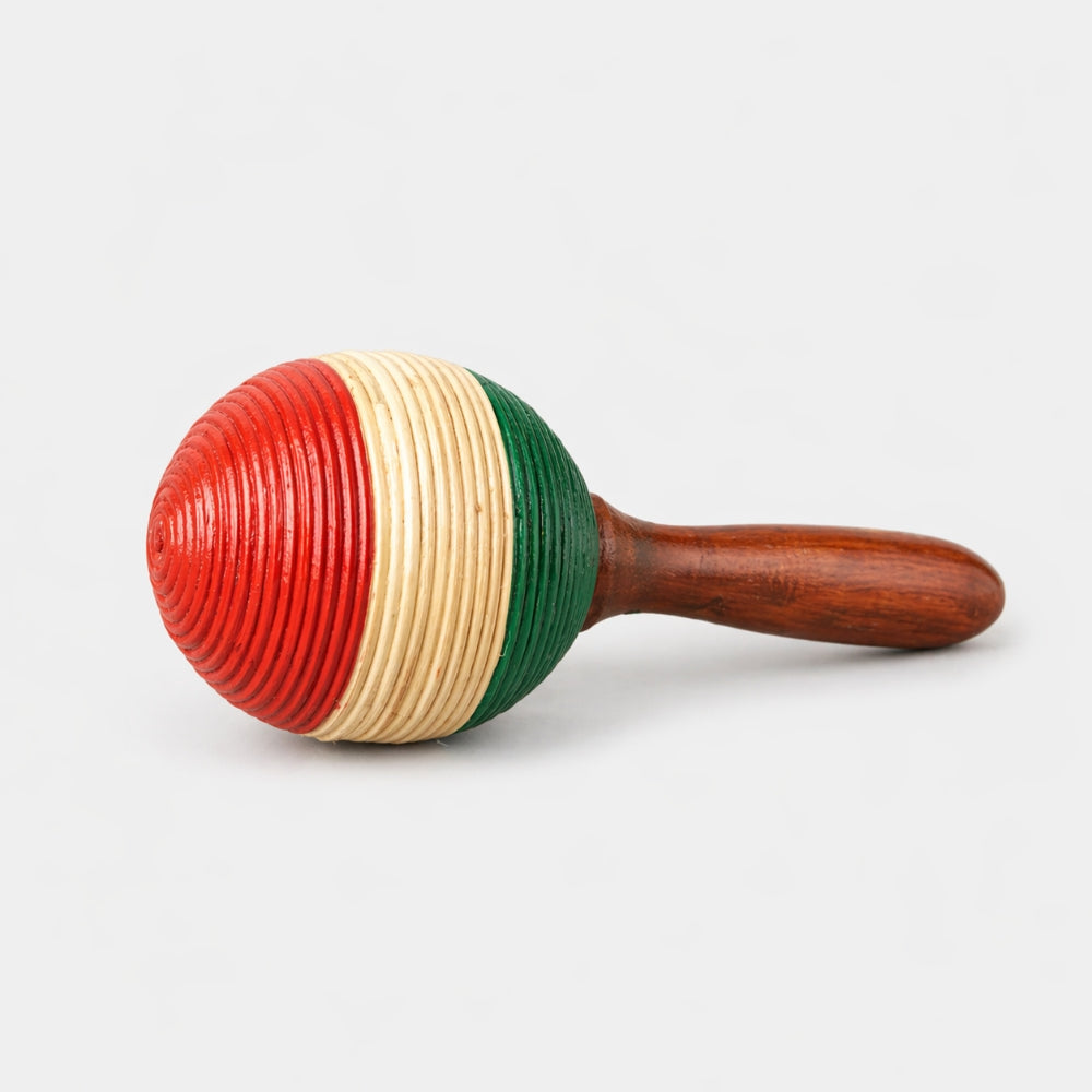 Colorful maraca with a wooden handle on a white background