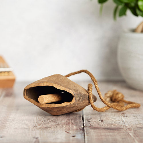 Inside wooden cowbell mechanism