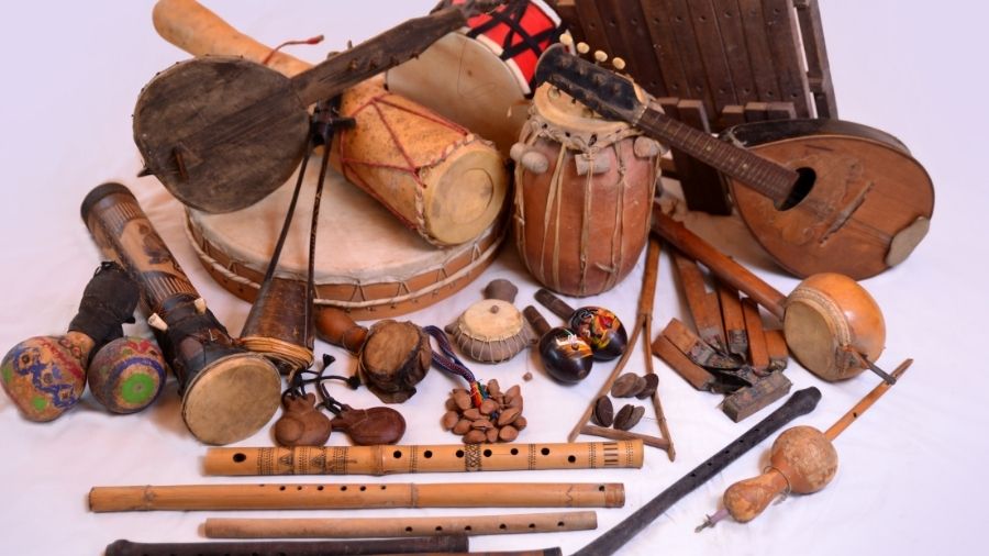 A traditional ethnic musical instrument displayed in a culturally rich setting.