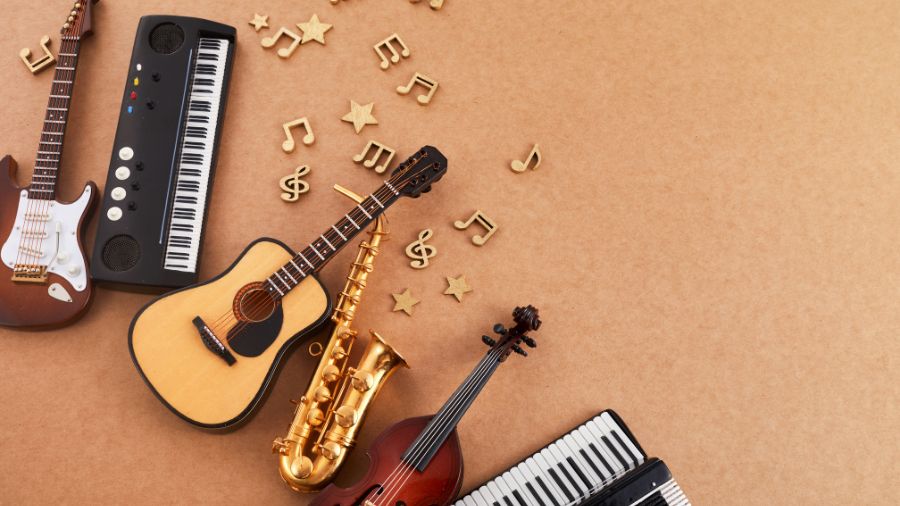 A collection of Western musical instruments, including an acoustic guitar, electric keyboard, saxophone, and violin, arranged on a brown background with decorative musical notes.