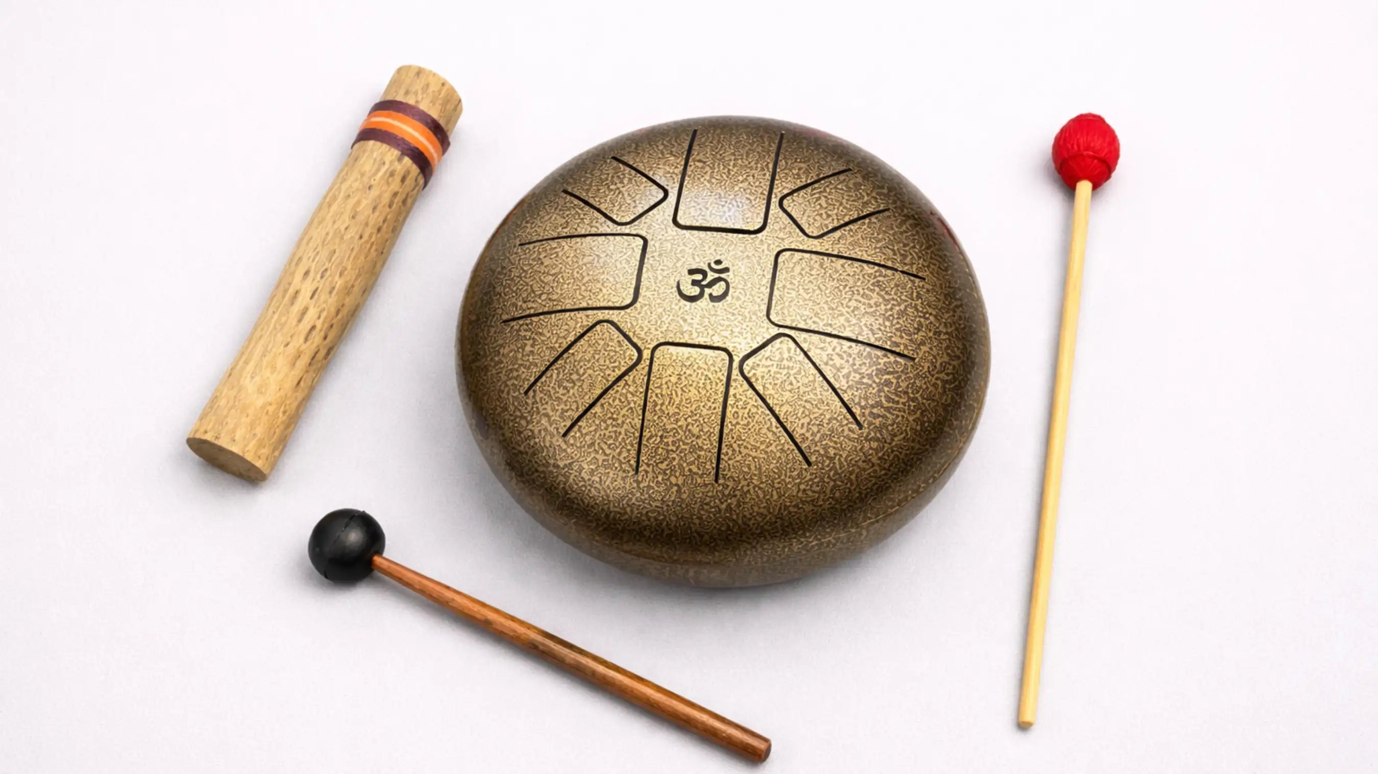 tongue drum with rainstick, wool beater and rubber mallet