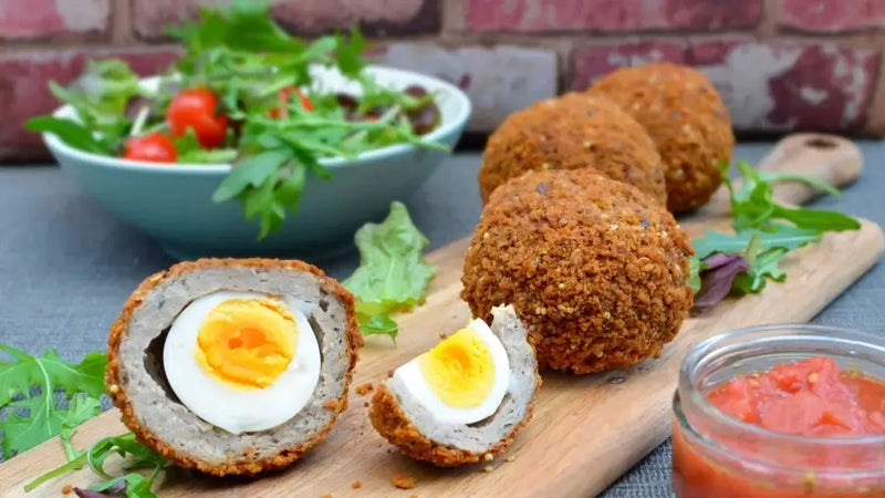 Scotch eggs with pork meat and breadcrumbs