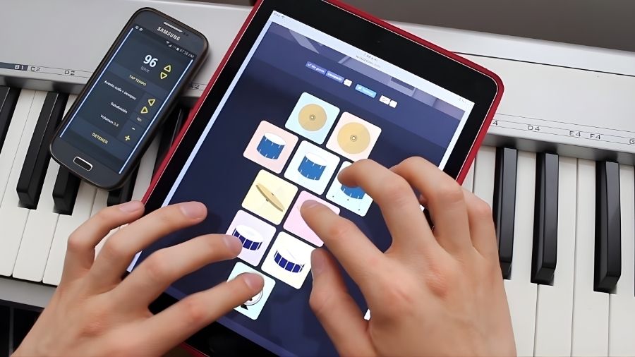 A webpage from showing a person playing virtual instruments (piano, drums, metronome) available online.