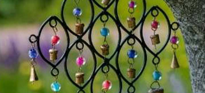 indian wind chime with cow bells and colourful glass