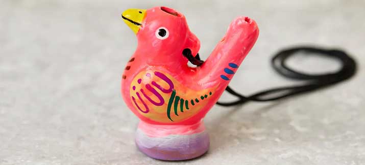 pink bird water whistle made from clay