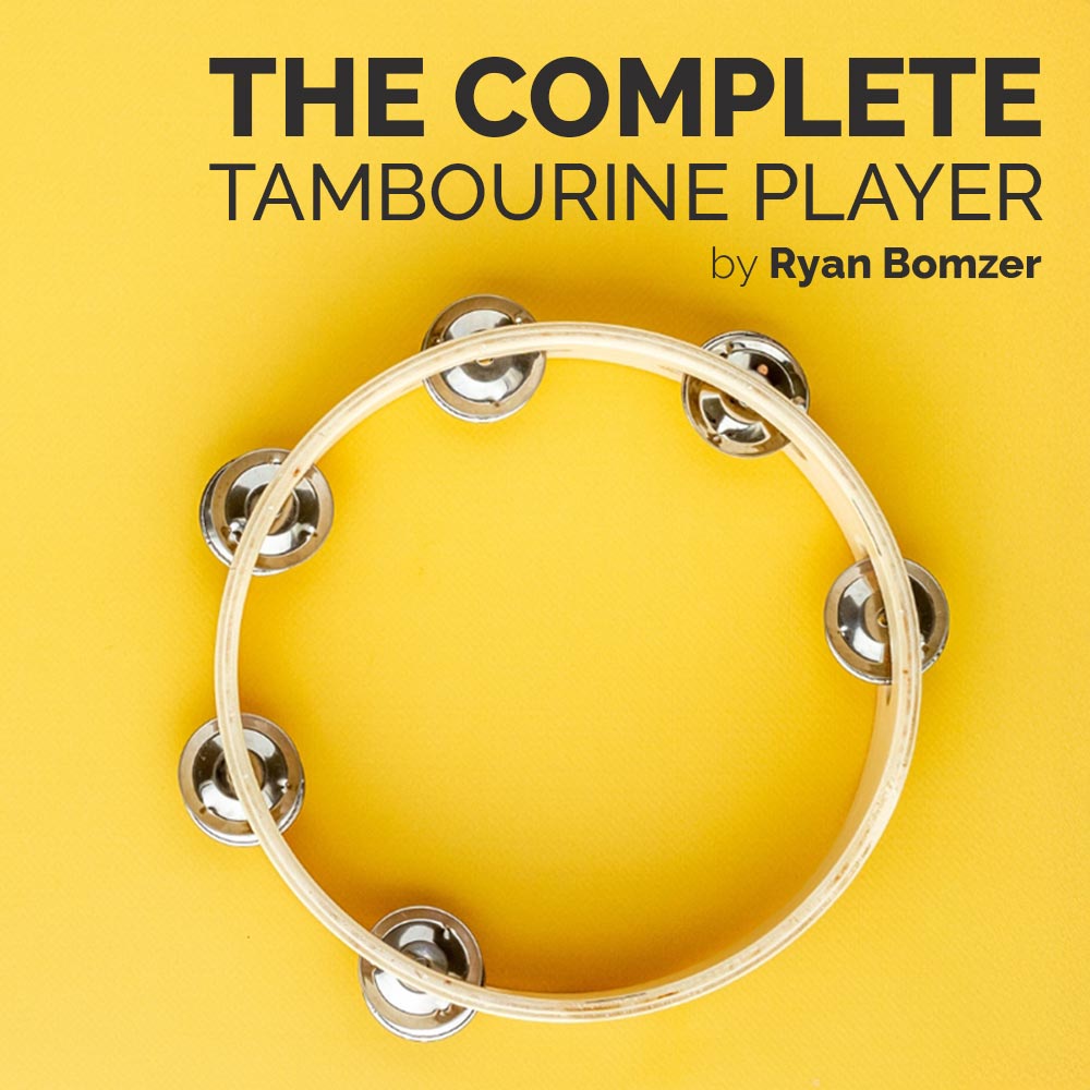 Tambourine on a yellow background with text 'The Complete Tambourine Player by Ryan Bomzer'.