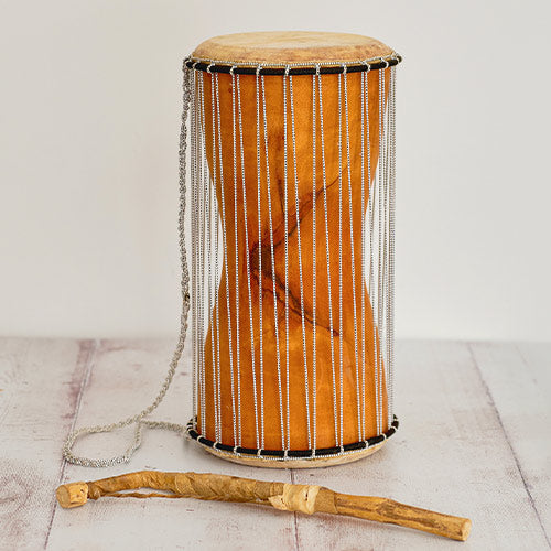 Traditional African talking drum with beater