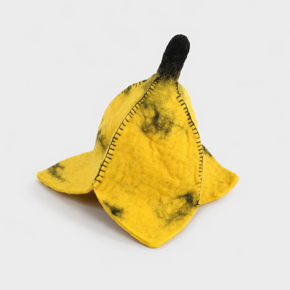 Banana Peel Shaped Fruit Festival felt wool hat on plain background