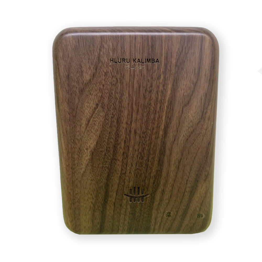 Back view of the Black Walnut Hluru Kalimba with 34 keys, featuring the Hluru logo, on a white background.