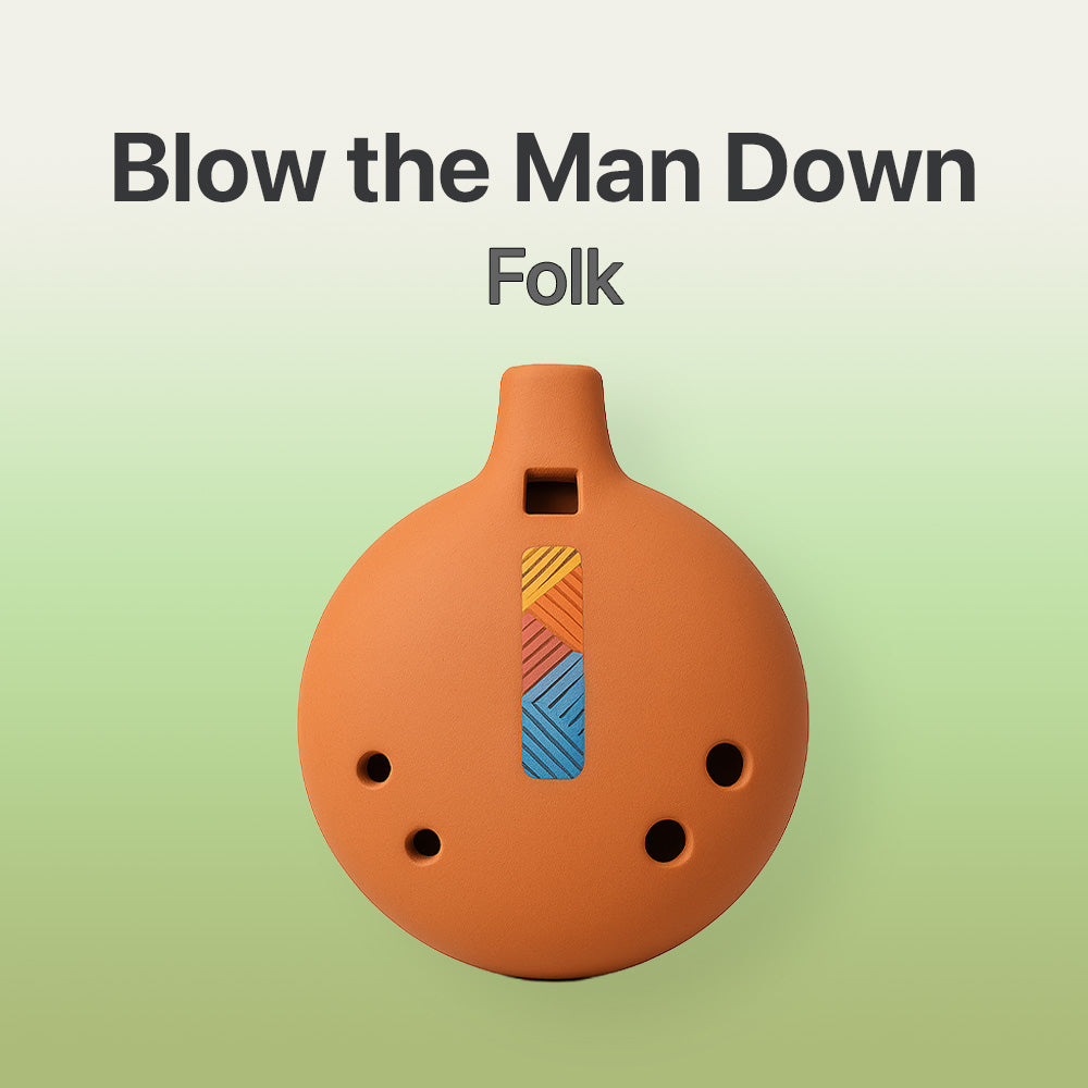 Terracotta ocarina with colorful design on a light green background, featuring the text 'Blow the Man Down Folk'.