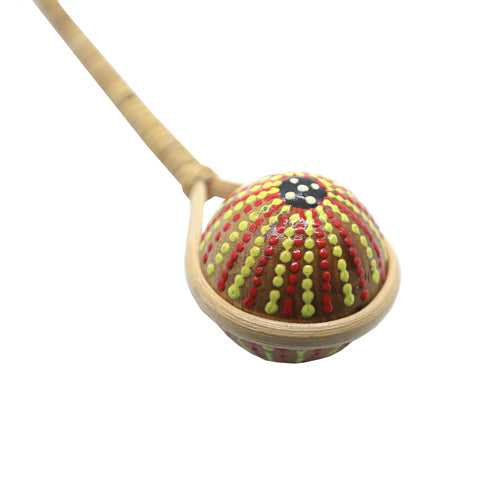 red and yellow dot painted ball rattan shaker