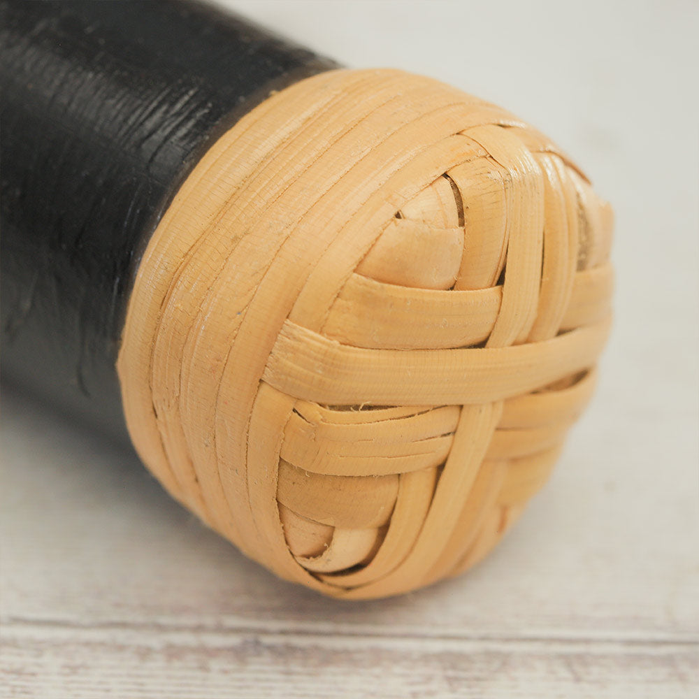 40cm Rainstick Close Up showing the sealed end and the black painted bamboo. 