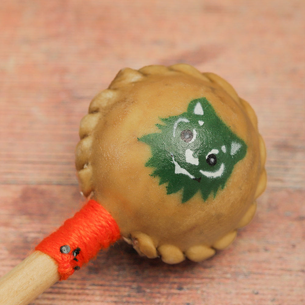 Close-up of the hand-painted design on the shaker's head.