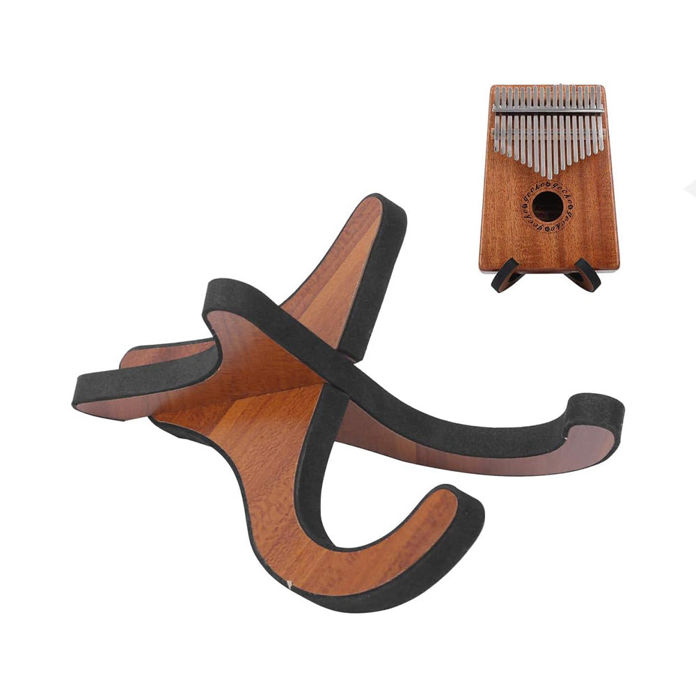 Kalimba thumb piano placed on a setup kalimba stand, shown on a white background.