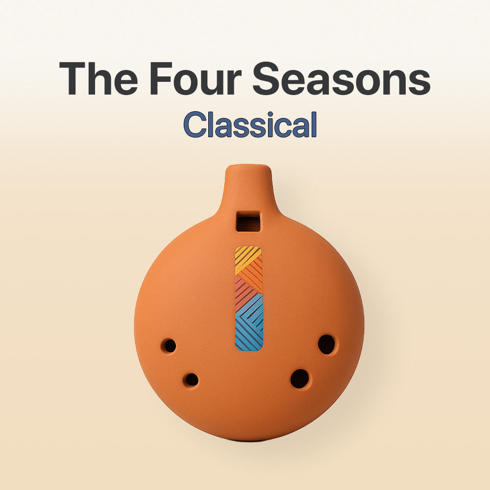 Ceramic ocarina with colorful design on a beige background, featuring 'The Four Seasons Classical' text.