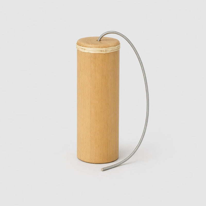 bamboo thunder drum with spring on grey background 