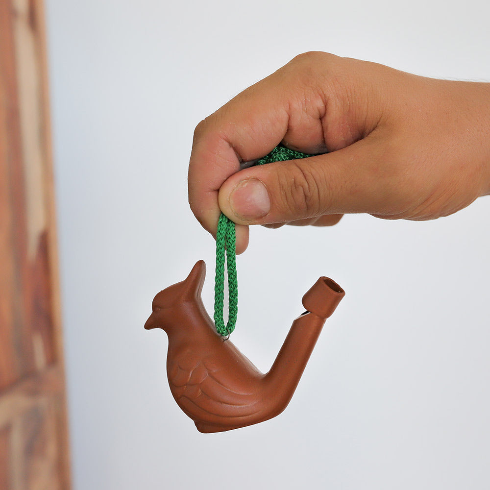 scale image of unpainted Peruvian bird whistle 