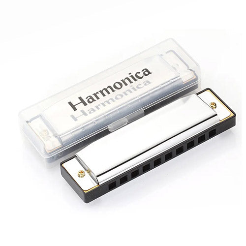 harmonica next to box