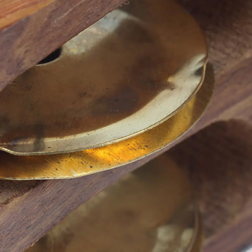 Close up of brass metal khartal bell