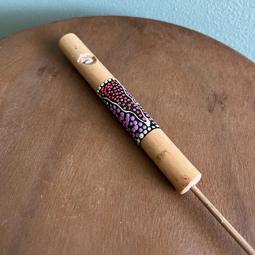 dot painted bamboo whistle